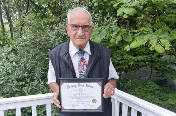 Military veteran, 91, receives Triway High diploma